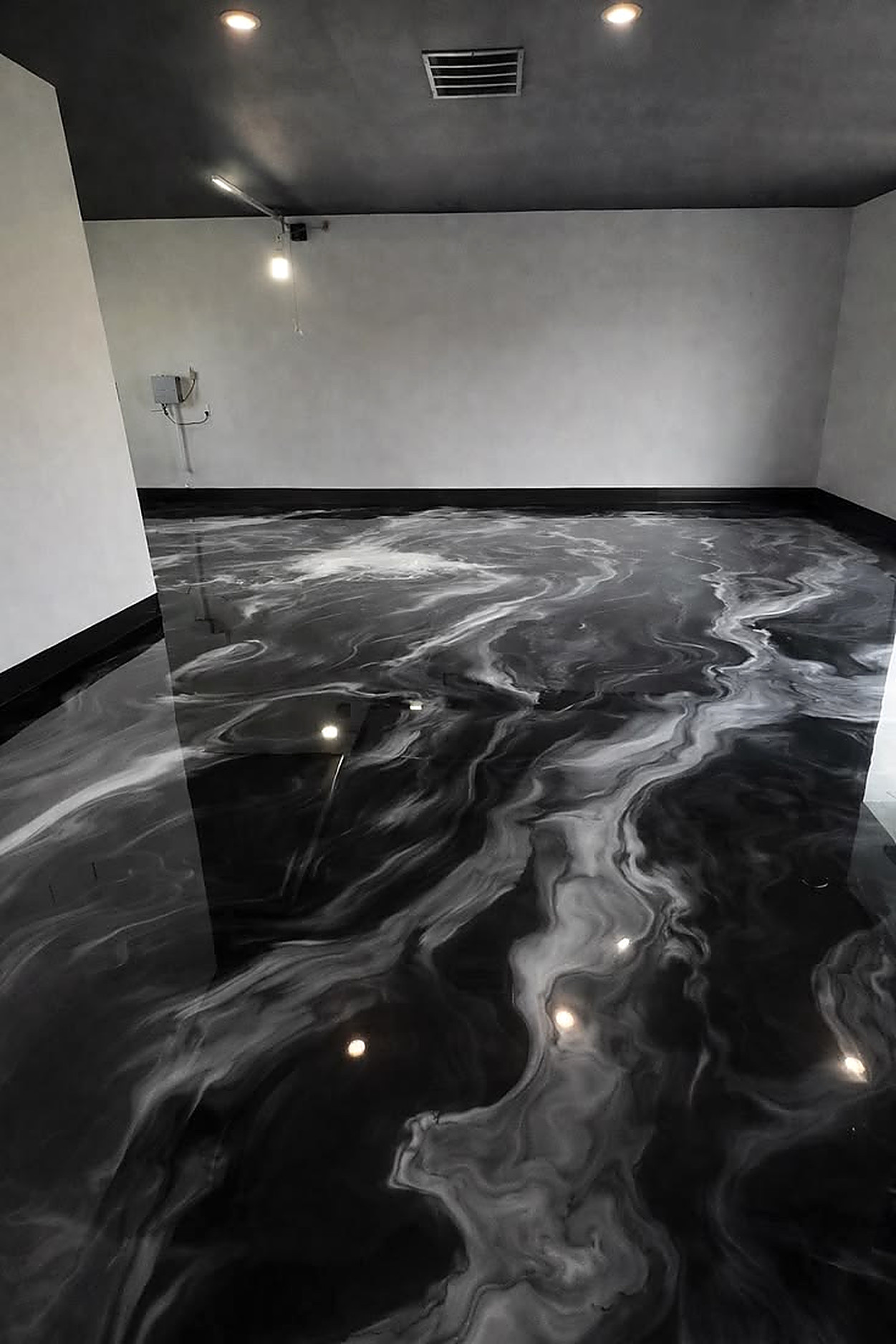 Black and white marble metallic epoxy floor